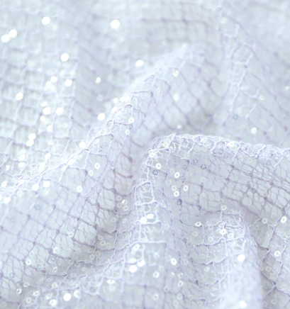 The Allure Of Shimmer Sequin Fabric To Elevate Garments To New Heights
